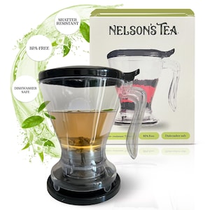 May include: A clear glass tea infuser with a black lid and handle. The infuser has a built-in strainer and sits on a black base. The infuser is filled with loose leaf tea and is surrounded by green leaves. The box behind the infuser says "NELSON'S TEA" and has the words "Shatter Resistant", "BPA-Free", and "Dishwasher Safe" on it.