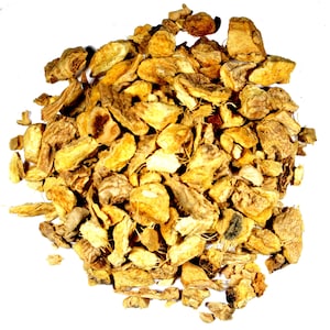 May include: Dried ginger root pieces, a natural ingredient for cooking and herbal remedies. The pieces are a light brown color and have a rough texture.