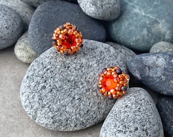 brilliant orange earrings. red orange crystal stud earrings. vermillion earrings for fall. sterling silver stud earrings