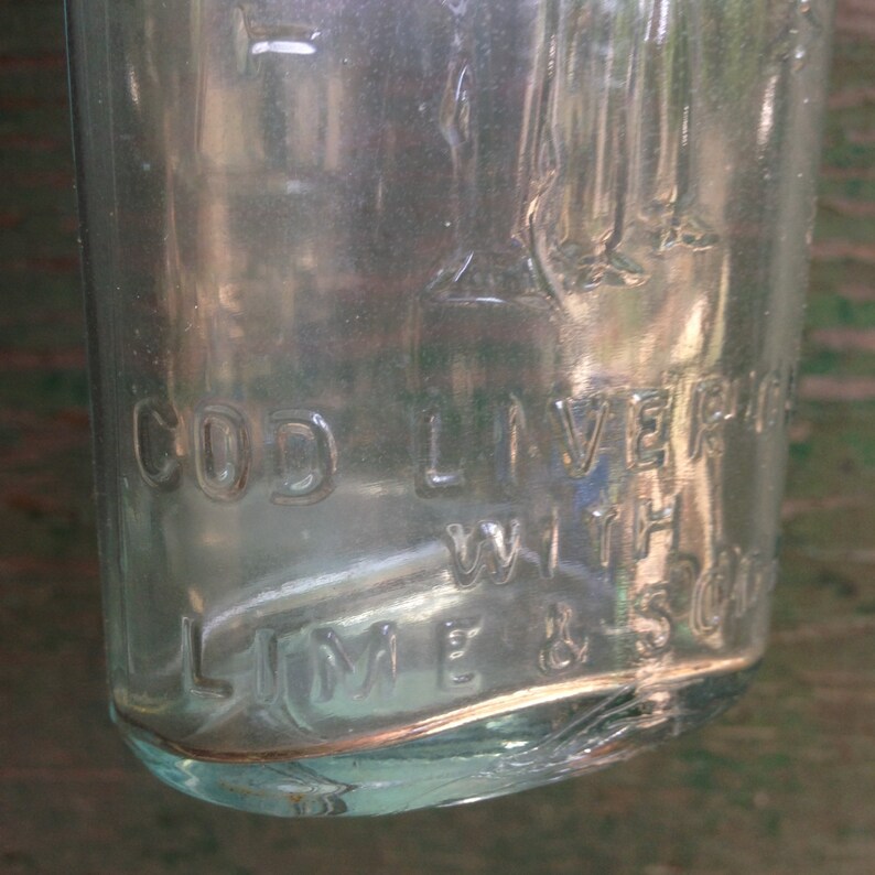Antique Scotts Emulsion cod liver oil with lime glass bottle | Etsy