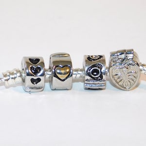 European Hinged Clip Lock Stopper Bead hearts fits most charm bracelet styles.  Help save cats/kittens.