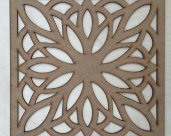 May include: A brown wooden square panel with a decorative cutout design. The design features a repeating pattern of leaves and swirls.