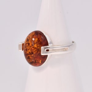 Sterling silver and natural honey Baltic amber oval ring