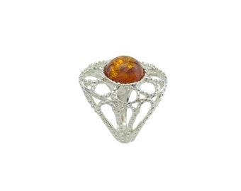 Sterling silver ring with natural Baltic amber