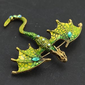 Silver dragon brooch or pendant with zirconia, green and yellow dragon pin
