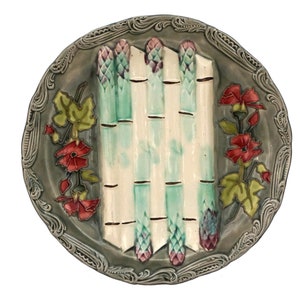 A French Majolica Asparagus Plate with Flowers by Longchamp