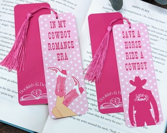 May include: Two pink and white bookmark designs with pink tassels. The first bookmark features a pair of cowboy boots and the text "In My Cowboy Romance Era". The second bookmark features a silhouette of a cowboy with the text "Save a Horse Ride a Cowboy" and "Yee Haw".