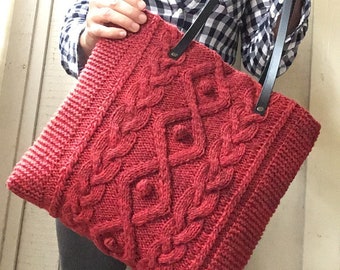 Red hand knitted tote bag with leather handles