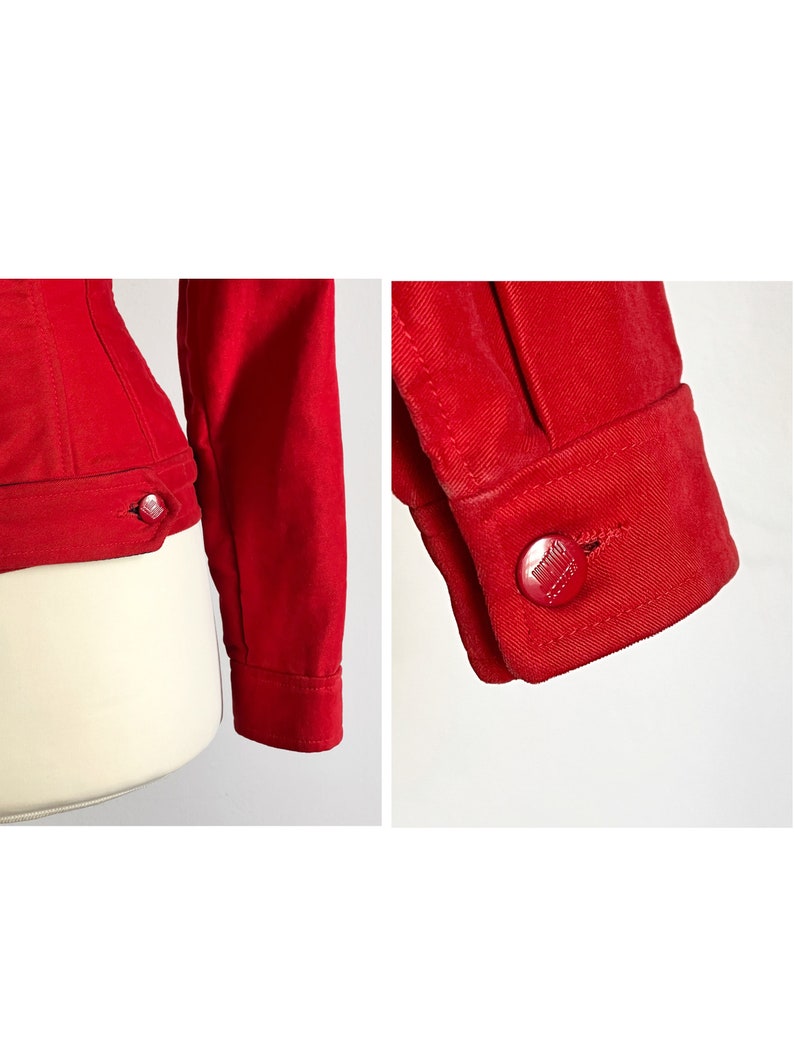 May include: A red denim jacket with a button closure and long sleeves. The jacket has a fitted silhouette and a classic design.