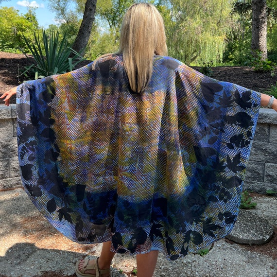 Elegant silk crepe de chine cape, sarong or shoulder wrap, hand-dyed in blue with gold and patterned with leaves.