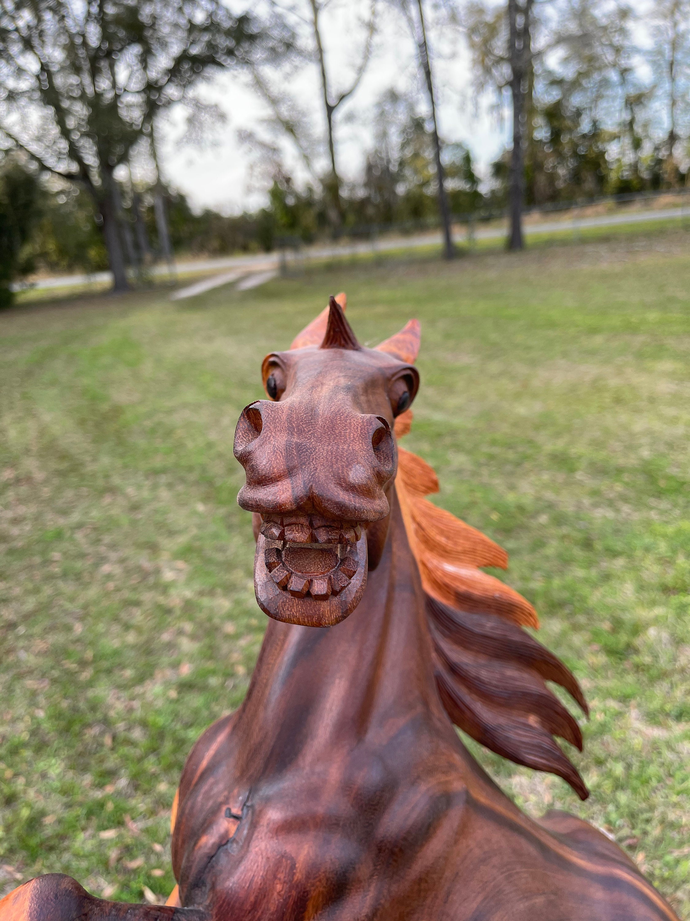 large wooden horse sculpture