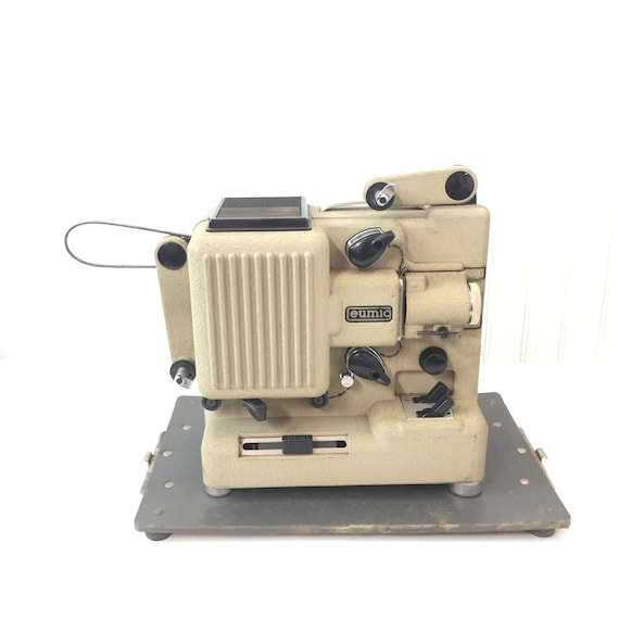 Projecteur EUMIG P8. Etat Proche du Neuf, Garantie, + films