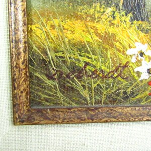 May include: A framed oil painting of a landscape with a field of tall grass and wildflowers. The painting is signed "DeWitt" in the lower right corner.
