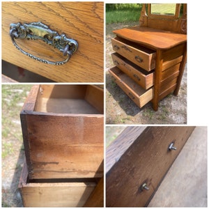 May include: Antique wooden dresser with three drawers and a mirror. The dresser is made of oak wood and has a dark brown finish. The drawers have ornate metal handles. The mirror is framed in wood and has a beveled edge.