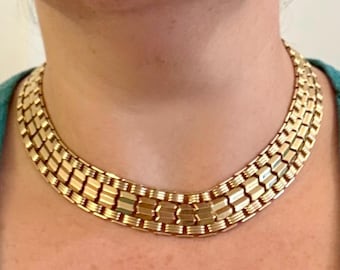 Collar dorado Sarah Coventry MCM