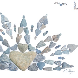 May include: A heart shape made of gray and green stones surrounded by smaller gray heart-shaped stones. The stones are arranged in a radiating pattern on a white background.