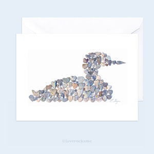 a loon note card with a photograph of a loon made out of heart rocks