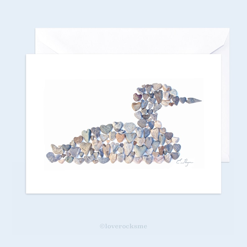 a loon note card with a photograph of a loon made out of heart rocks