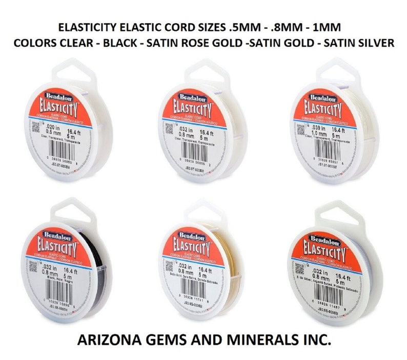 May include: Five spools of Beadalon Elasticity elastic cord in different colors: clear, black, satin rose gold, satin gold, and satin silver. Each spool is labeled with the cord size in inches and millimeters, as well as the length in feet and meters.