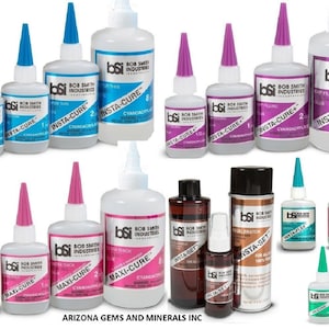 May include: Assortment of Bob Smith Industries glue bottles in various sizes and colors. The bottles are labeled with different types of glue, including Insta-Cure, Maxi-Cure, Insta-Set, and Insta-Flex. The bottles are arranged in two rows on a white surface.