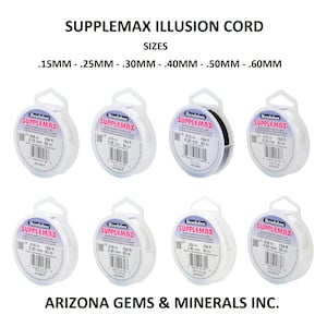 May include: Eight spools of white and black Beadalon Supplemax Illusion Cord in various sizes: 0.15 mm, 0.25 mm, 0.30 mm, 0.35 mm, 0.40 mm, 0.50 mm, and 0.60 mm. Each spool is labeled with the size and length of the cord.
