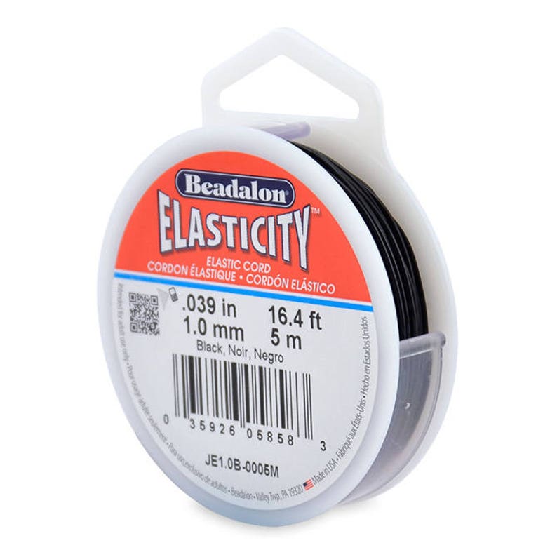 May include: A spool of black Beadalon Elasticity elastic cord, 16.4 feet (5 meters) long, with a diameter of 0.039 inches (1.0 mm). The label reads "Beadalon Elasticity Elastic Cord Cordon Elastique Cord&oacute;n El&aacute;stico Black, Noir, Negro".