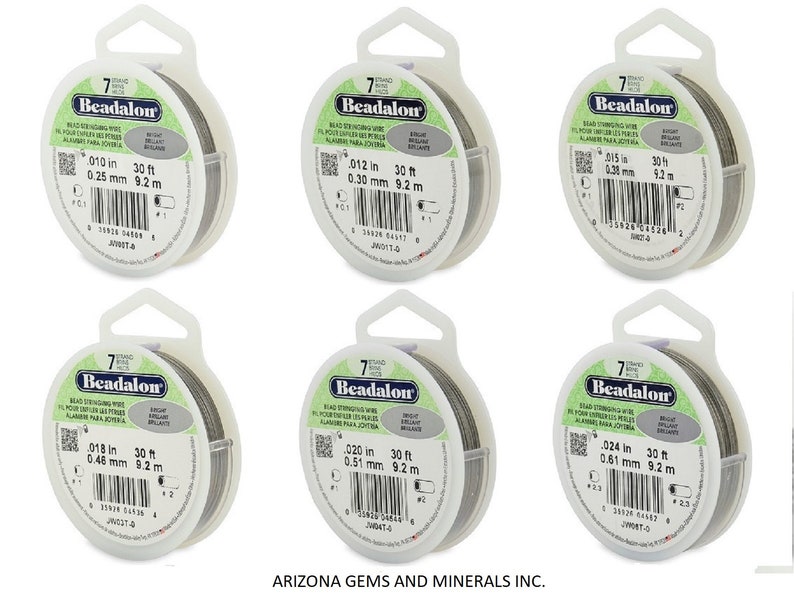 May include: Six spools of Beadalon 7-strand beading wire in various sizes. Each spool is labeled with the wire diameter in inches and millimeters, and the length in feet and meters. The spools are packaged in clear plastic with a hanging hole.