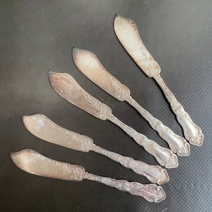 Antique 1846 Set of 5 butterknives by Rogers silver plated in good condition, beautifully engraved