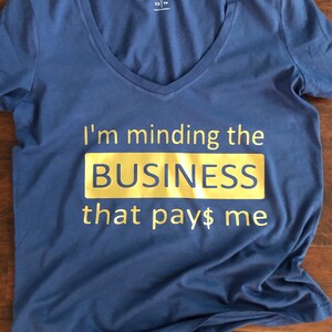 I’m Minding the Business that Pays Me T-shirt