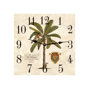 May include: A square clock with a vintage design featuring a palm tree with green leaves and yellow flowers. The clock face has Roman numerals and black hands. The background is a beige color with a faded texture.