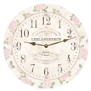 May include: Round wall clock with a vintage design. The clock face is cream-colored with Roman numerals and decorative script. It features a floral border of pink roses and the text "PAPETERIE ILLUSTRÉE LEBLANCHEMIN PARIS".