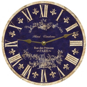 Pode incluir: Um mostrador de relógio azul e dourado com algarismos romanos e um design floral. O mostrador do relógio diz "Henri Vendome Rue des Princess PARIS".