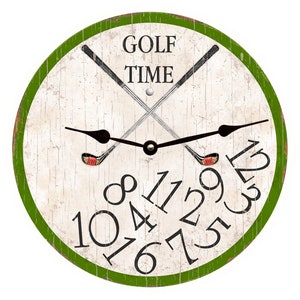 May include: A round, green-rimmed clock with a white face and black numbers. The clock features a pair of crossed golf clubs and the text "GOLF TIME".