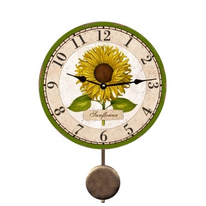 May include: A green and cream colored pendulum clock with a sunflower design. The clock face has black Roman numerals and a black pendulum. The clock face also has the word "Sunflower" written on it.