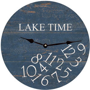 May include: A blue wooden clock with white numbers and the text "LAKE TIME". The numbers are arranged in a random pattern around the clock face.