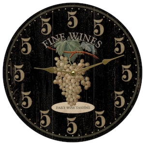 May include: Black and gold clock with a distressed wood look. The clock face features a bunch of white grapes with green leaves and the text "Fine Wines Daily Wine Tasting".