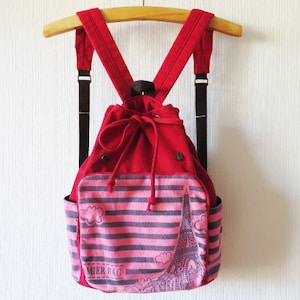 Roter Segeltuchrucksack Heller Baumwollrucksack Sommer Kordelzug Eimer Rucksack zu Fuß Reisetasche Rot Wochenendtasche
