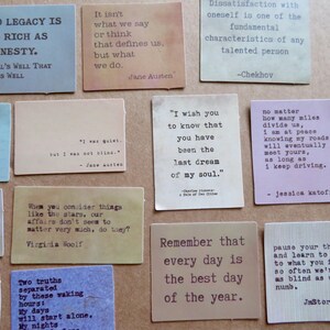 May include: A collection of square cards with quotes from famous authors. The cards are in various colors, including blue, beige, and pink, with black text. The quotes cover themes of honesty, dreams, and self-reflection.