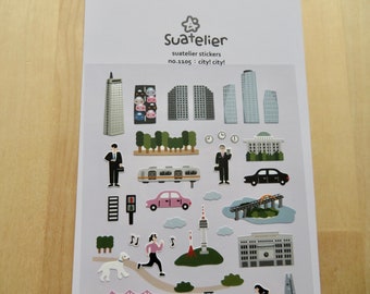 May include: Sheet of Suatelier stickers featuring city-themed illustrations. Includes skyscrapers, trees, cars, people, a train, and a bridge. The text "suatelier stickers no.1105 : city! city!" is printed at the top.