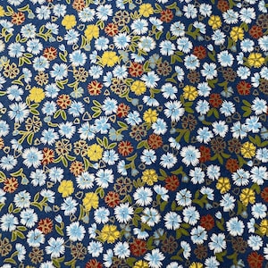 Origami paper, Chiyogami  paper, Yuzen paper, Washi paper.  Blue with Multi colored and gold flowers pattern.