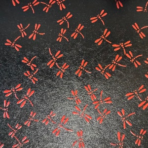 Lacquered Japanese Yuzen paper Dragonfly. Perfect for origami, scrapbooking, and bookbinding.  Dragonfly embossed red/black.