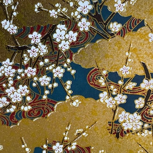 Origami paper, Chiyogami  paper, Yuzen paper, Washi paper.  Plum blossom pattern with gold and blue.