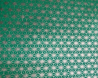 Origami paper, Chiyogami  paper, Yuzen paper, Washi paper.  Gold on Green geometric stars.