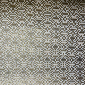 Origami paper, Chiyogami  paper, Yuzen paper, Washi paper.  Gold on white geometric pattern.