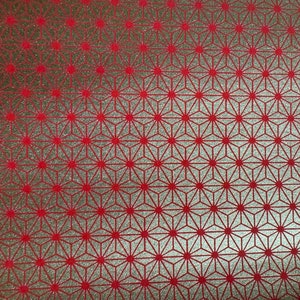 Origami paper, Chiyogami  paper, Yuzen paper, Washi paper.  Gold Stars on Red geometric pattern.