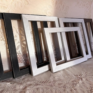 May include: A rustic wooden sign with the text "Welcome to our home" in white lettering. The sign features a distressed finish and a simple, inviting design, perfect for a front porch or entryway.