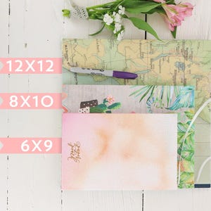 May include: Three different sizes of blank note cards with a watercolor background. The cards are stacked on top of each other and the sizes are labeled 12x12, 8x10, and 6x9.