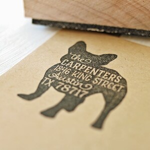 May include: A black silhouette of a French bulldog with the text "the CARPENTERS 1846 KING STREET Austin TX 78717" printed on it.