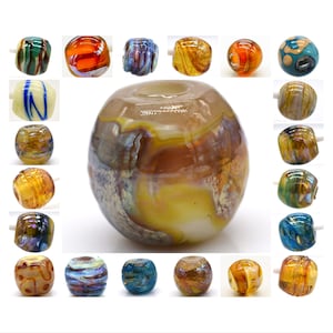 May include: A collection of 18 glass beads in various colors and patterns, including blue, green, yellow, orange, and brown. The beads are round and have a smooth, glossy finish.