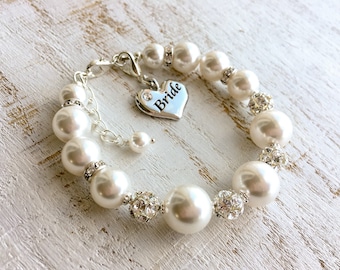 Wedding gifts for daughter on her wedding day from mother and father, mom and dad. Elegant and classy Swarovski pearl bracelet, bride charm.